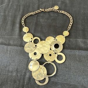 Chicos statement bib necklace with silver rings.20in adjustable.